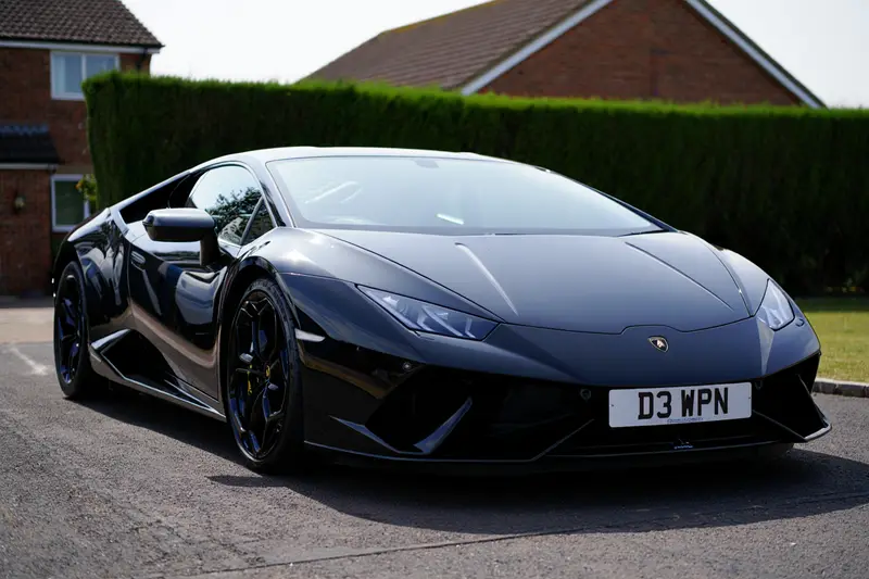 Black Lamborghini Huracán on a driveway wearing the registration D3 WPN